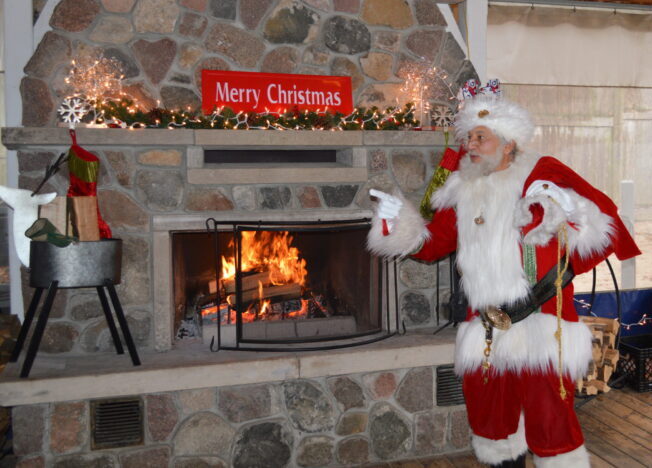 Santa at PIER 290 by fireplace
